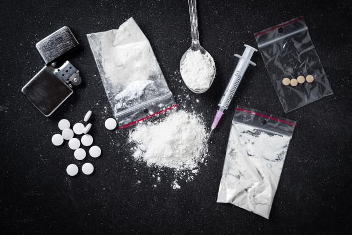 Illicit Drugs on Dark Table